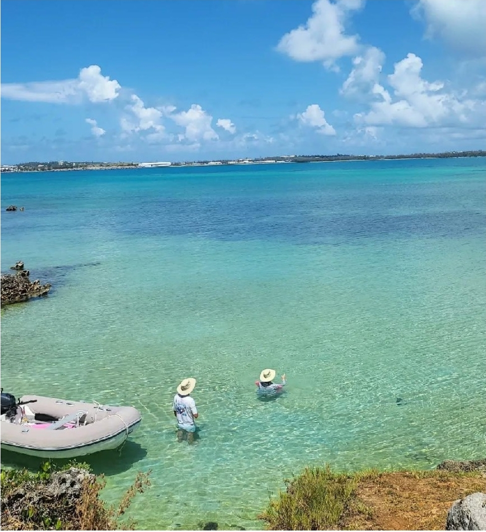 Two people in the ocean at Blue Hole Park in Bermuda.